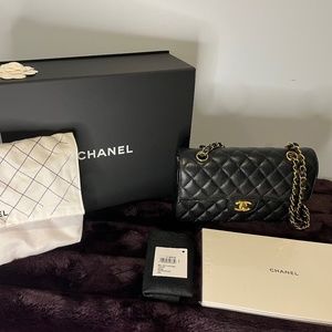 Classic small double flap Chanel bag caviar